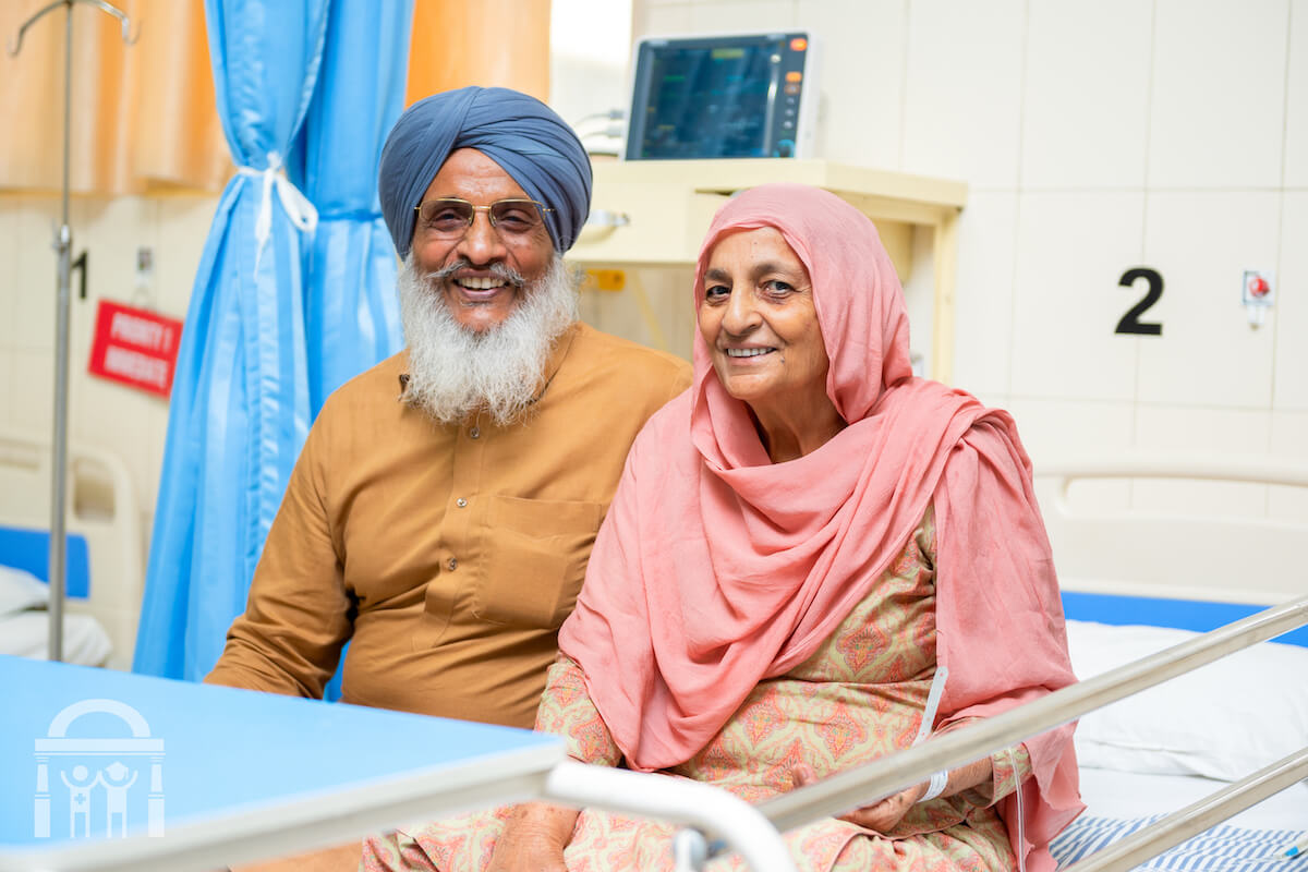 Couple in emergency ward on bed at Guru Nanak Mission Hospital Dhahan Kaleran near Banga in Punjab