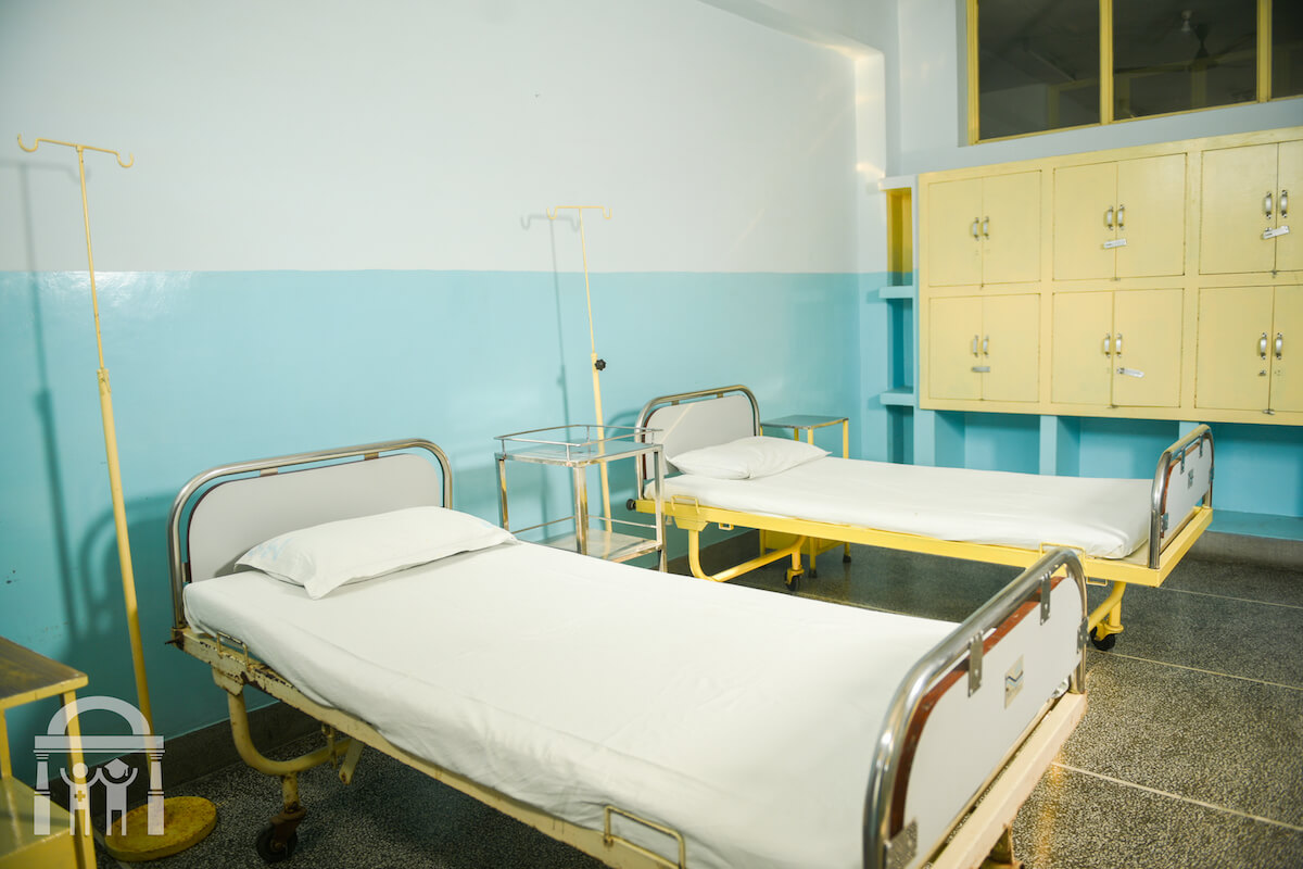 Shared room in hospital with clean beds at Guru Nanak Mission Hospital Dhahan Kaleran near Banga, Punjab