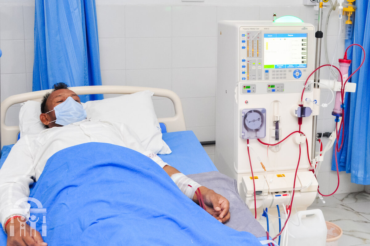 Patient hooked up to dialysis machine at Guru Nanak Mission Hospital Dhahan Kaleran near Banga in Punjab