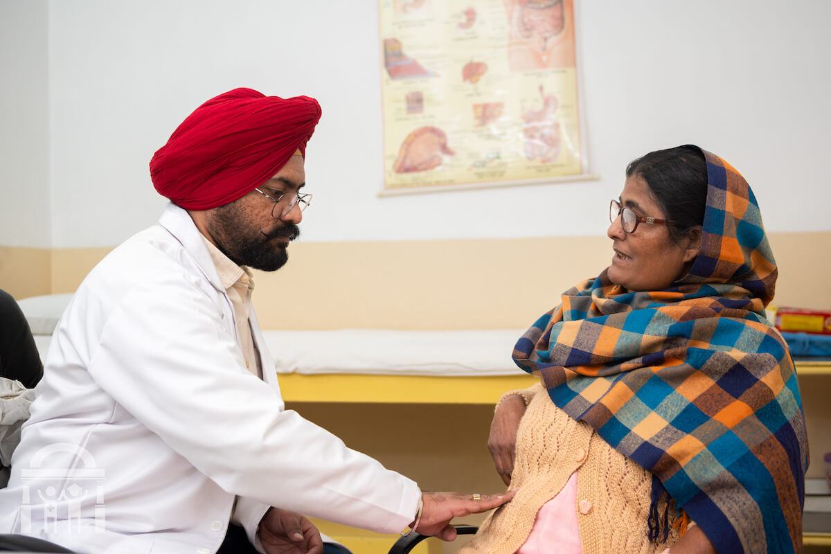General surgeon checking patient in a meeting at Guru Nanak Mission Hospital in Dhahan Kaleran near Banga in Shaheed Bhagat Singh Nagar district